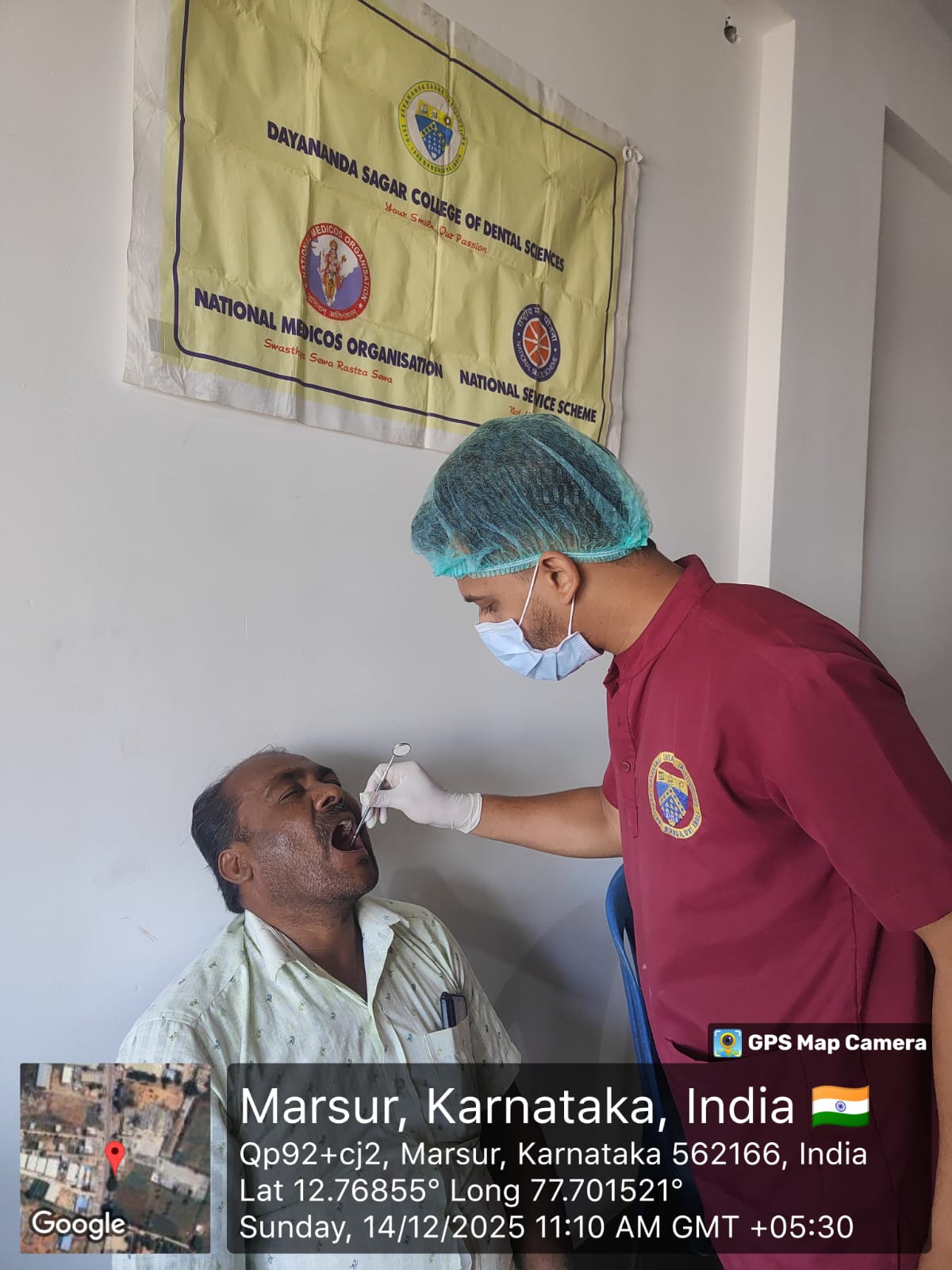 Dentist performing an oral examination on a patient